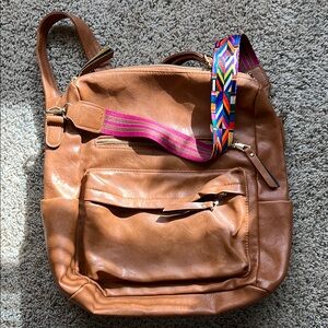 Tan Leather Backpack with Colorful Strap